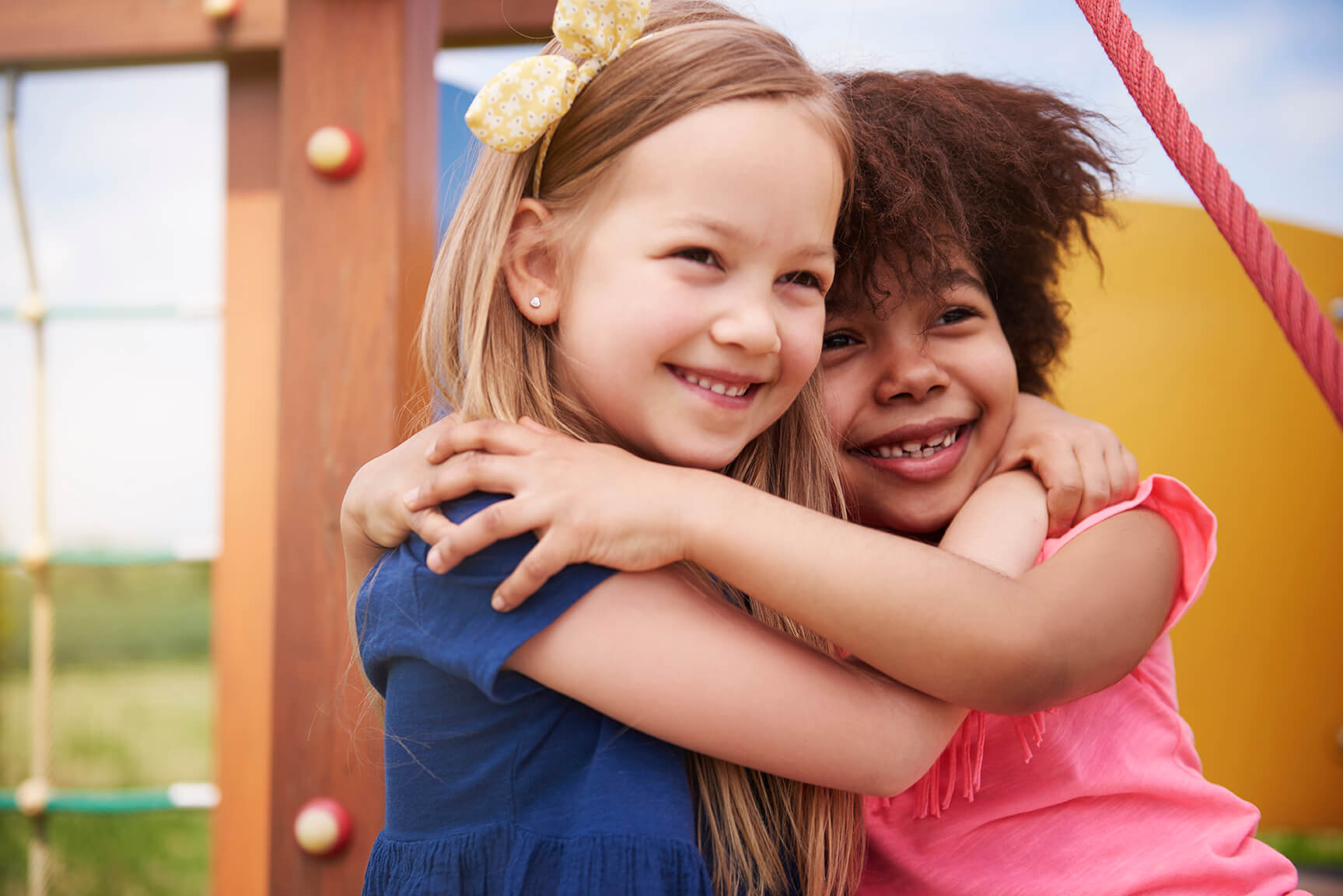 two children hugging